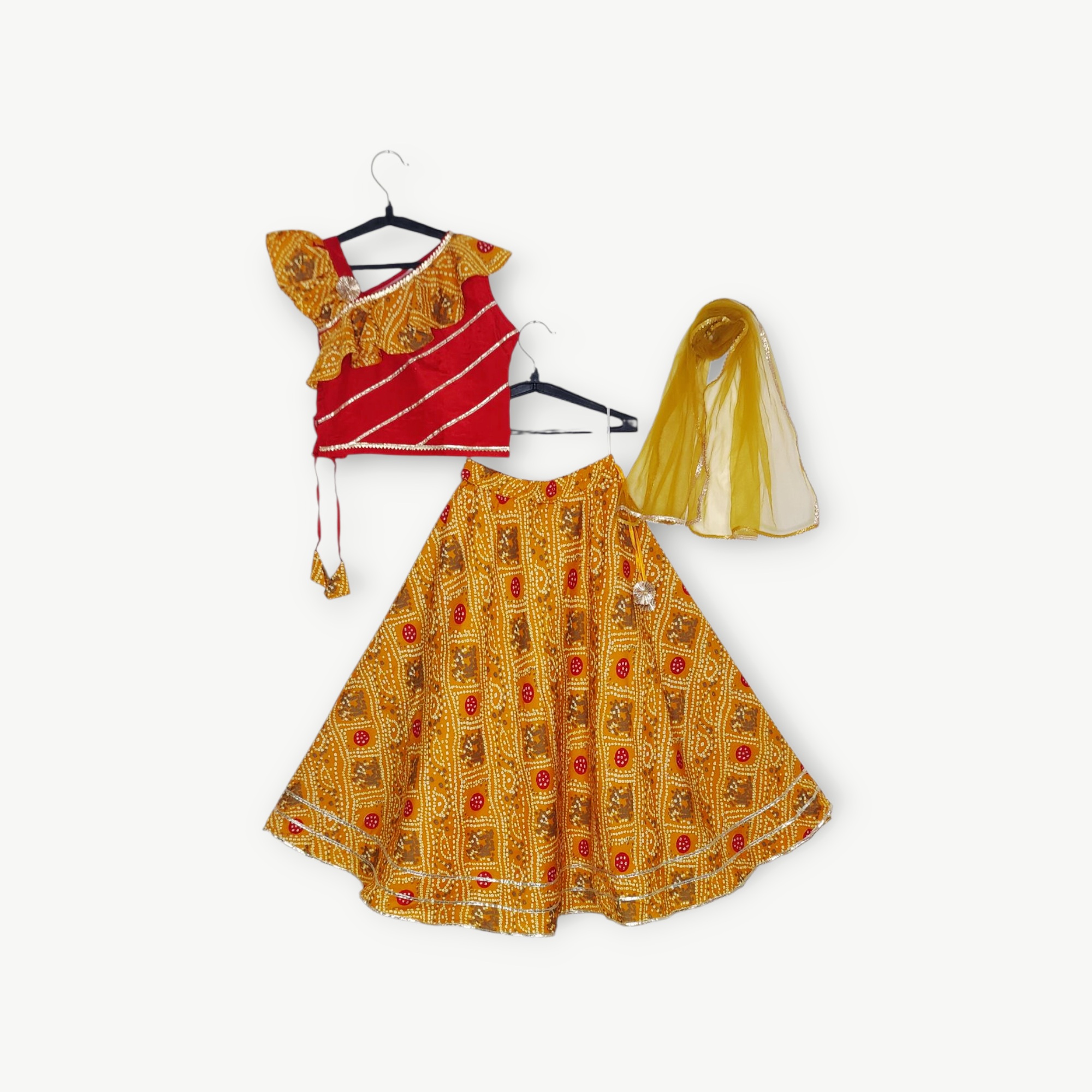Girls' Mustard Yellow & Red Bandhani Printed Lehenga Choli with One-Shoulder Ruffle Top & Dupatta Set